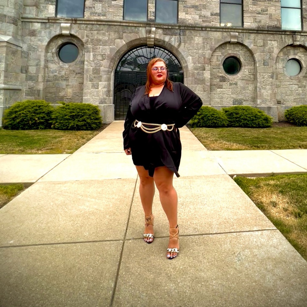 Little black dress. Long sleeve, short. Twist front design.